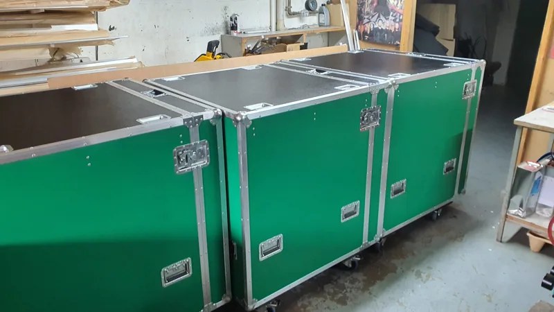Grüne Transportgehäuse