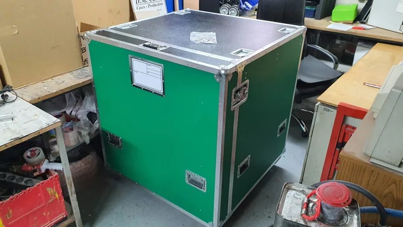 Grüne Transportgehäuse