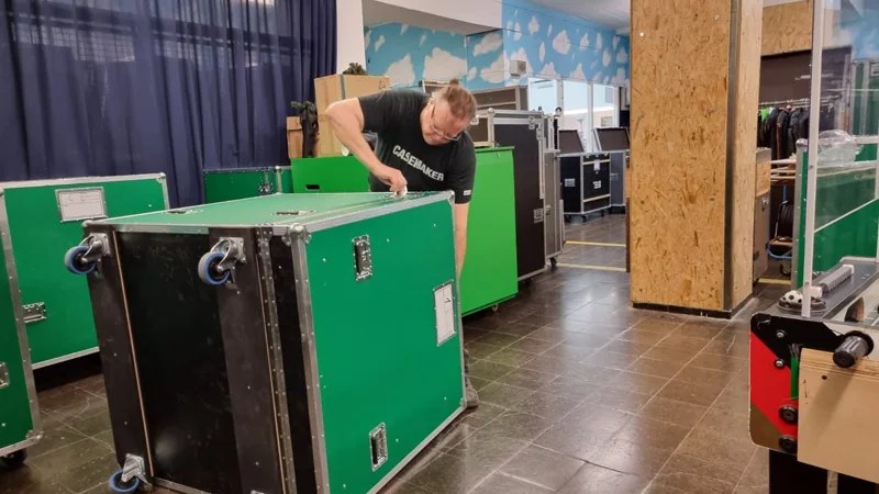 Grüne Transportgehäuse