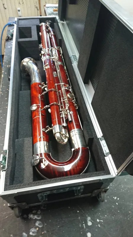 Holzblasinstrument im langen Case